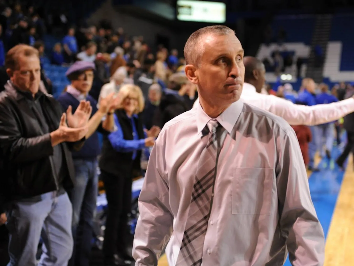 Bobby Hurley walks off the court after a Buffalo win over Western Michigan in Alumni Arena last season. Donors raised about $250,000 for a contract extension for the coach, who ultimately left for Arizona State.