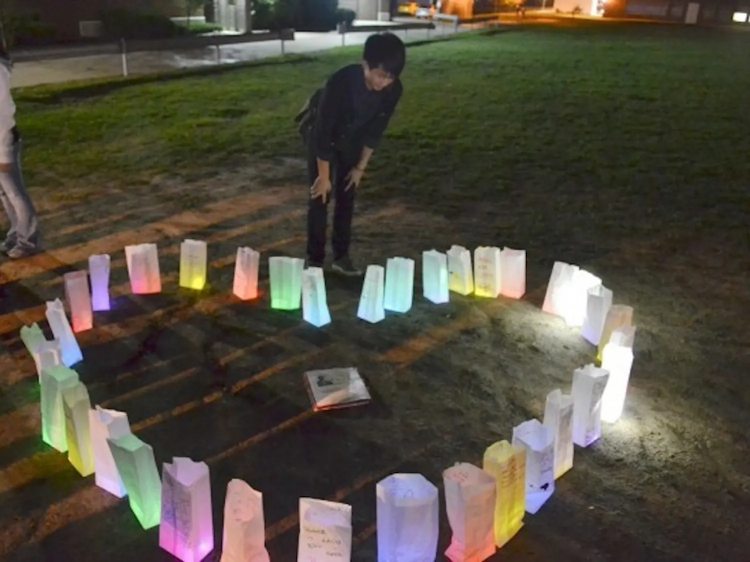Banny Chen (above), a senior communication major, is at a past memorial held in 2012 for his cousin, Danny Chen, who completed suicide after experiencing racial slurs and harassment in the army. Banny spoke about Danny’s experience on Wednesday night at the Asian American Student Union meeting, which focused on the meaning of racial slurs and their impact. Aline Kobayashi, The Spectrum