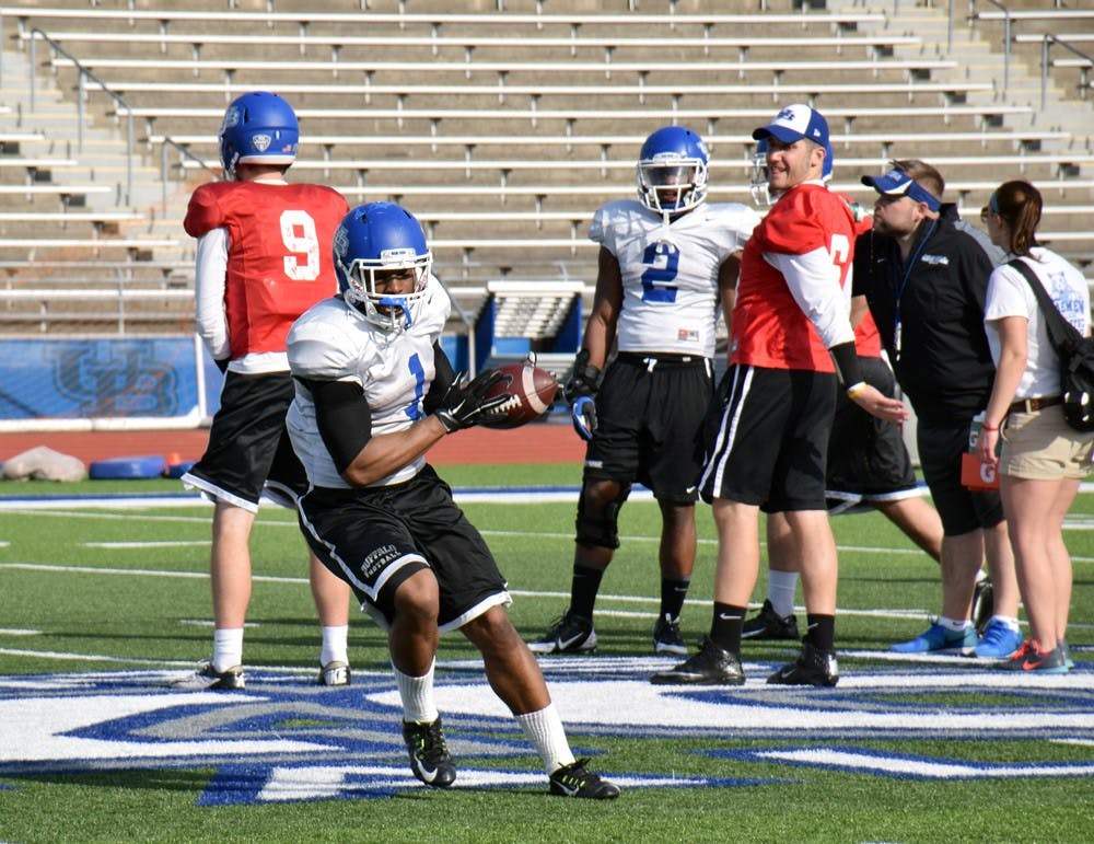<p>Anthone Taylor (1) catches the ball out of the backfield during a spring practice. Taylor looks to replicate his 2014 season, where he ran for 1,403 yards and 12 touchdowns.</p>
