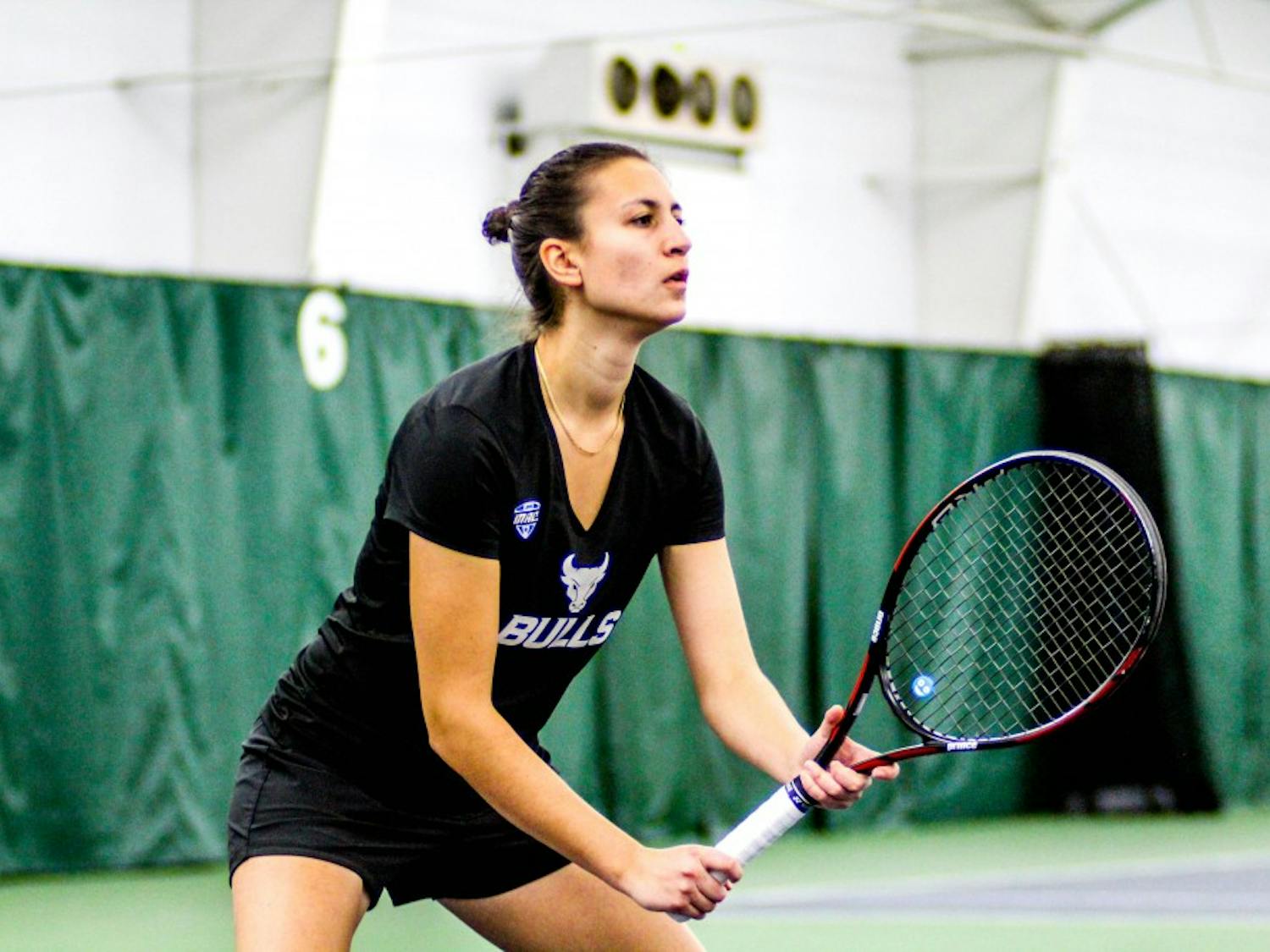 Tanja Stojanovska prepares to receive the serve. She hopes to upset on the second singles court as Buffalo takes on Northwestern in the NCAA tournament Friday.