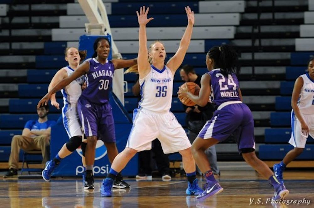 Junior guard Mackenzie Loesing recorded her 1,000th career point and 100th three-point shot in the 66-58 loss on Wednesday.
Yusong Shi, The Spectrum