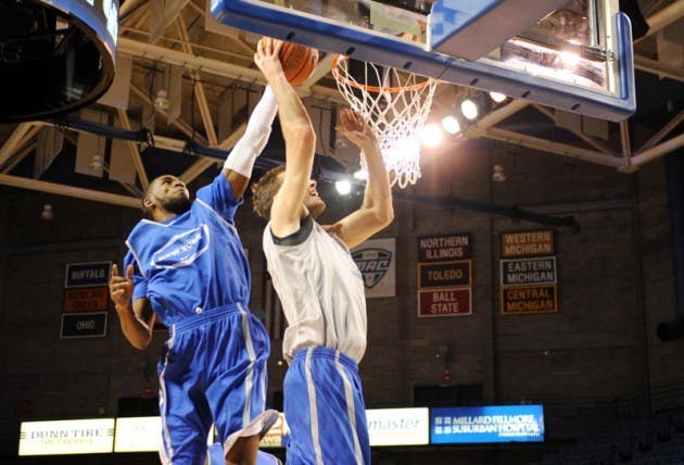 Junior forward Jamir Hanner attempts a shot block during a scrimmage at the Bulls Madness event Oct. 17. Men&rsquo;s basketball head coach Bobby Hurley said on Wednesday that Hanner has been removed from the Bulls for violating team rules.&nbsp;Yusong Shi, The Spectrum