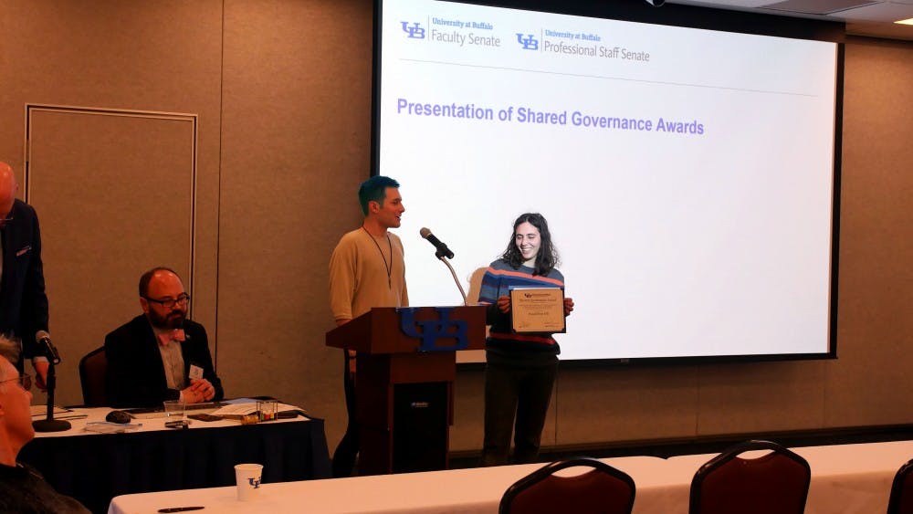 <p>Members of Fossil Free UB are presented with shared governance award. For two years, Fossil Free UB has asked the university to divest its fossil fuel-related holdings.</p>
