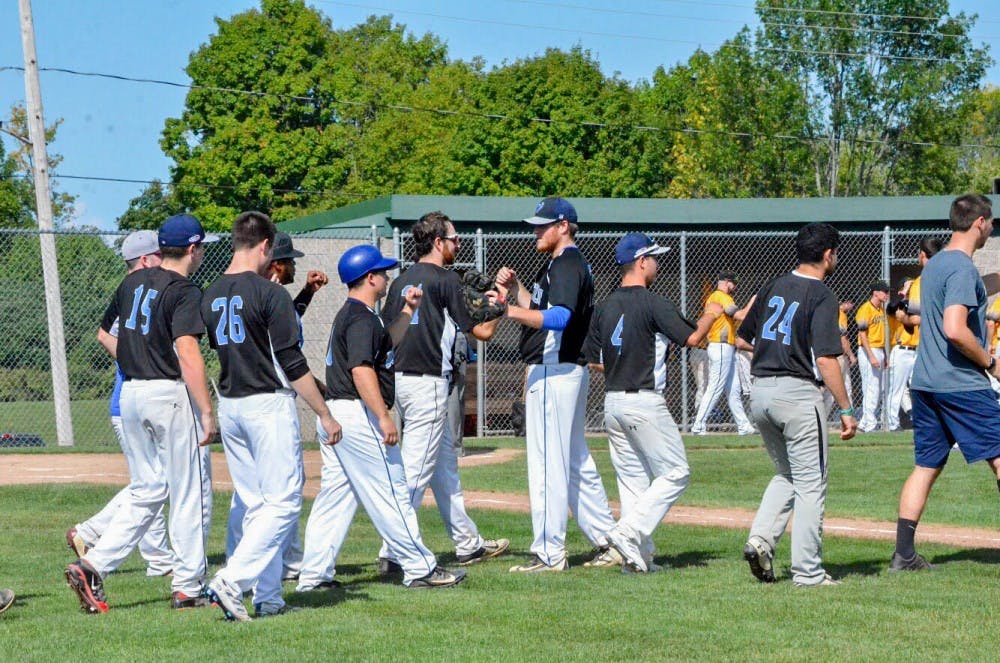 <p>The Bulls club baseball team gathers on the field after a game against SUNY Brockport in September. The Bulls are on a six game win streak and are currently the best team in their conference, as of Oct. 10.</p>