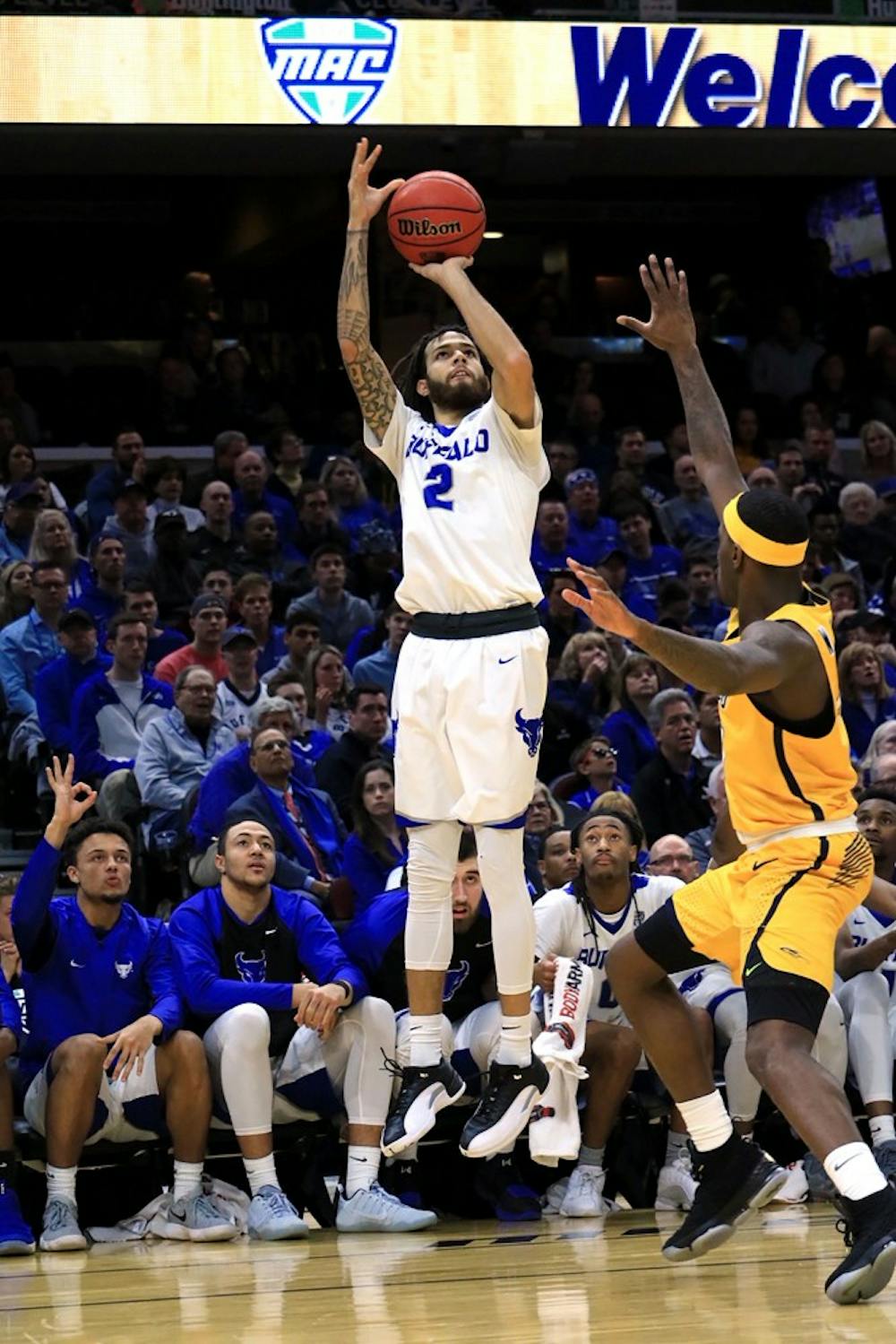 <p>Junior guard Jeremy Harris takes a shot from the corner. Harris is one of the three all-MAC selection returning to the Bulls this season.</p>