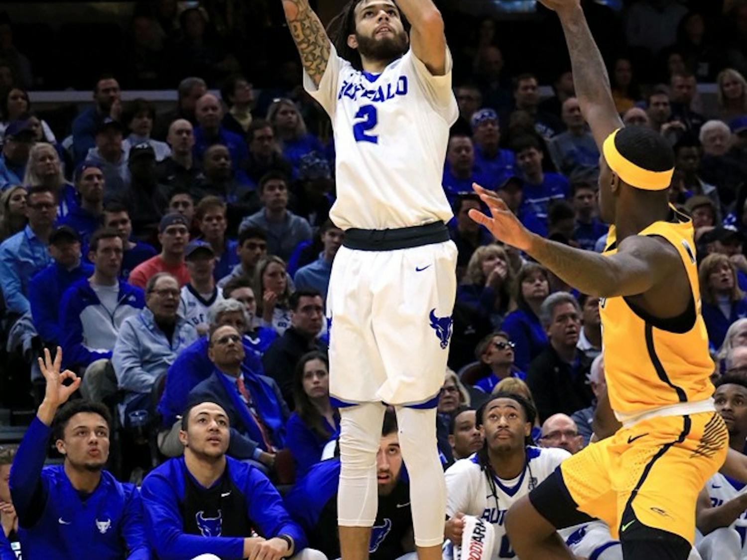 Junior guard Jeremy Harris takes a shot from the corner. Harris is one of the three all-MAC selection returning to the Bulls this season.