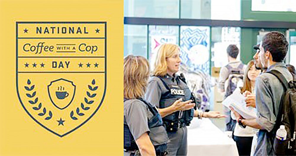 <p>University police officers talk with students at last year’s Coffee with a Cop event. UPD moved the event to Abbott Hall on South Campus this year.</p>