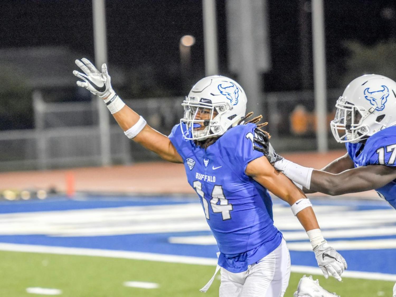 Sophomore Brandon Williams celebrates a tackle. Bulls lost senior day game to Miami (OH).