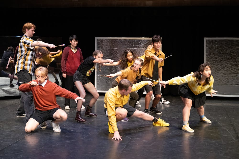 <p>The cast of "Puffs" gathers in formation to defend Hogwarts against Voldemort in this student-directed tongue-in-cheek play on the Harry Potter universe.</p>