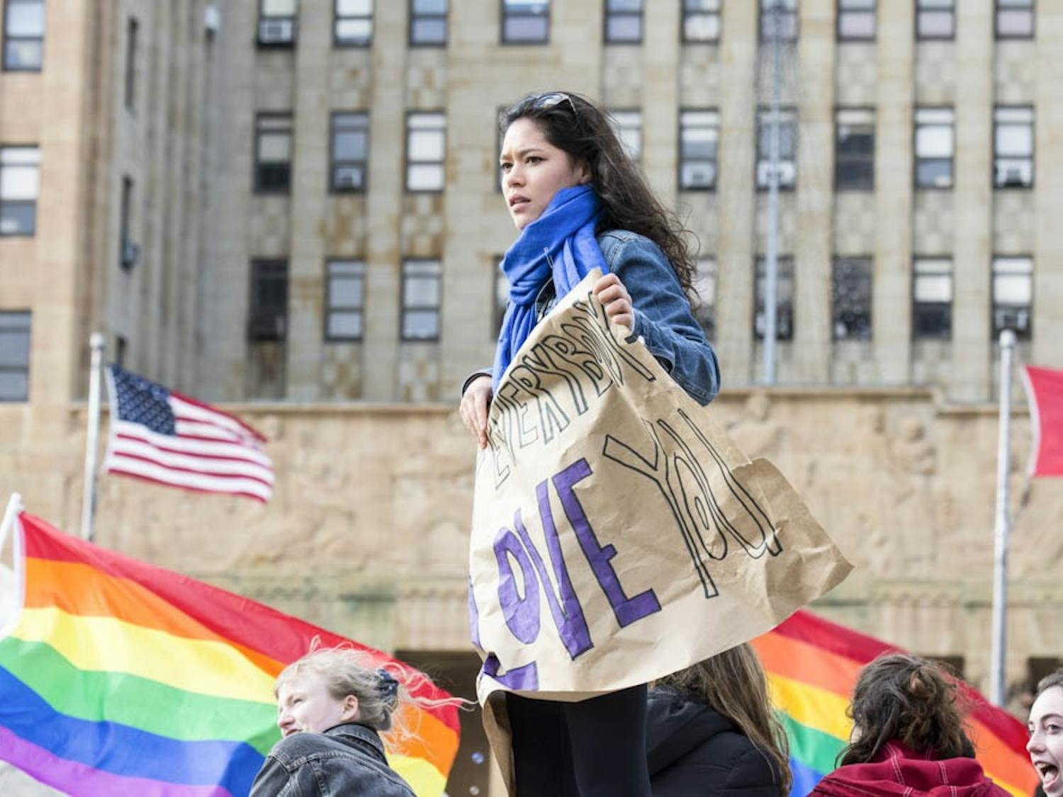 Approximately 300 people gathered at the Niagara Circle on Sunday to voice their concerns about President-elect Donald Trump. Some people held signs that read “We reject the president elect” and “Love Trump’s hate.”
