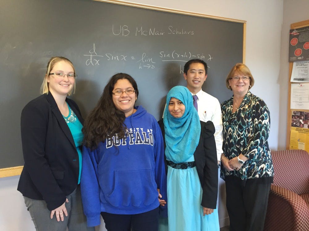 <p>(Left to right) Heather Hagenbuch, Valerie Tapia, Nadia Syeda, Chris Yuen, Susan Ott. Tapia and Syeda are two McNair Scholars whose work has been recognized among professionals in their fields.</p>