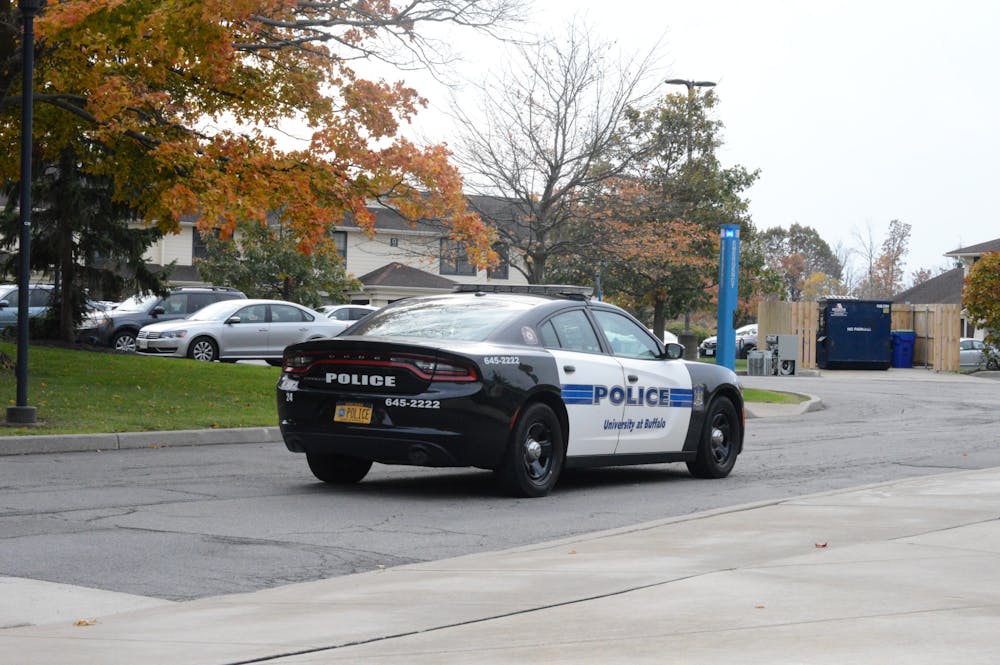 A picture of a police car patrolling Creekside Village.