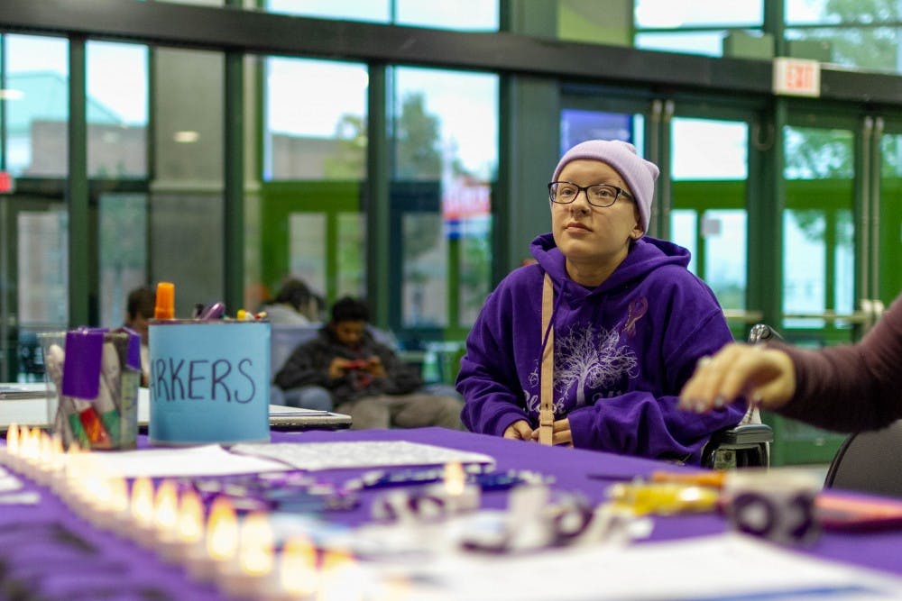 <p>Students at Wednesday’s Take Back the Night event held a candlelight vigil to support victims of sexual assault. The event was part of the Student Association’s sexual violence prevention week.</p>