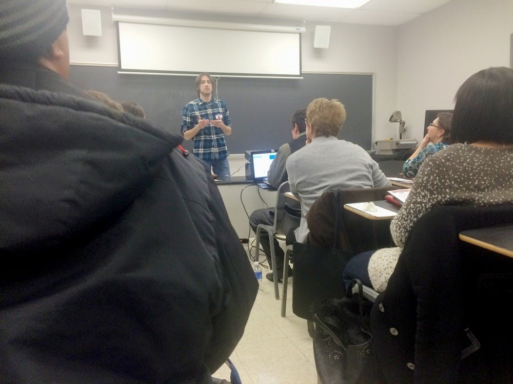 <p>Aric Gaughan speaks about the effects of coffee in a speech at the UB Toastmasters meeting last week.</p>