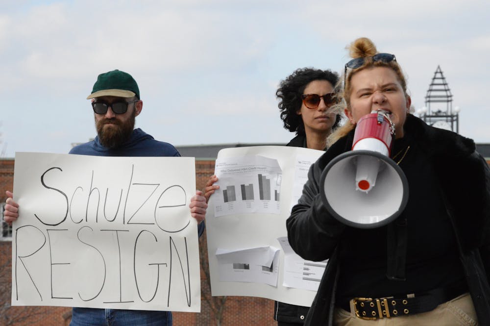 <p>At least 20 demonstrators, led by classics Ph. D. student Tina Bekkali-Poio, took to Clemens Hall Thursday afternoon to call for CAS Dean Robin Schulze to resign.</p>