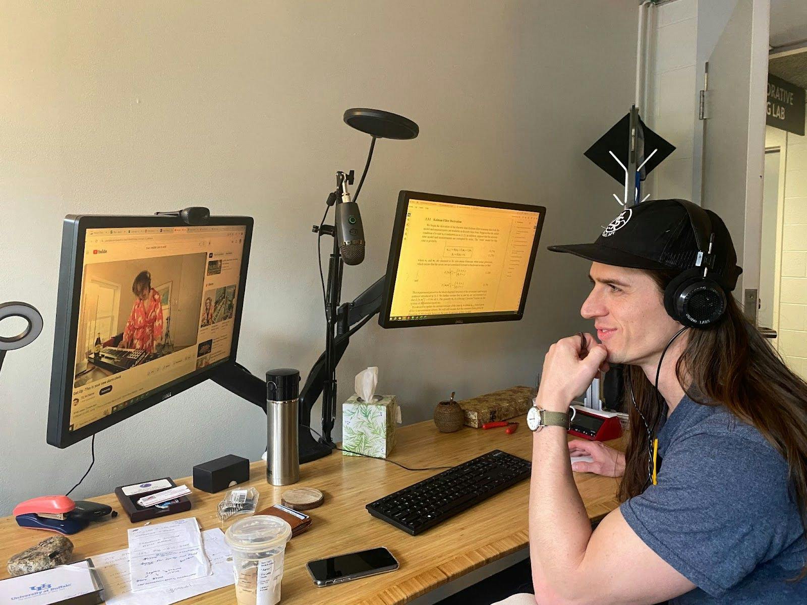 Aaron Estes, seen here in his Bell Hall office, listened to Röyksopp as an undergraduate.&nbsp;