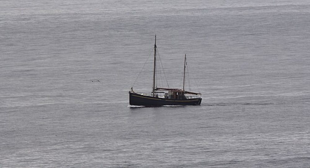 A picture of an old sailboat.