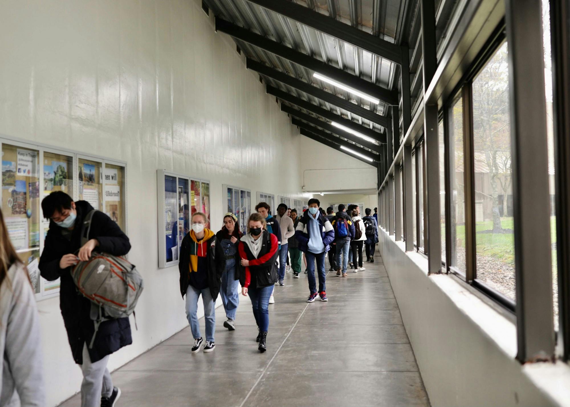 Students walk through the connecting tunnel between the Student Union and Knox Hall Monday.