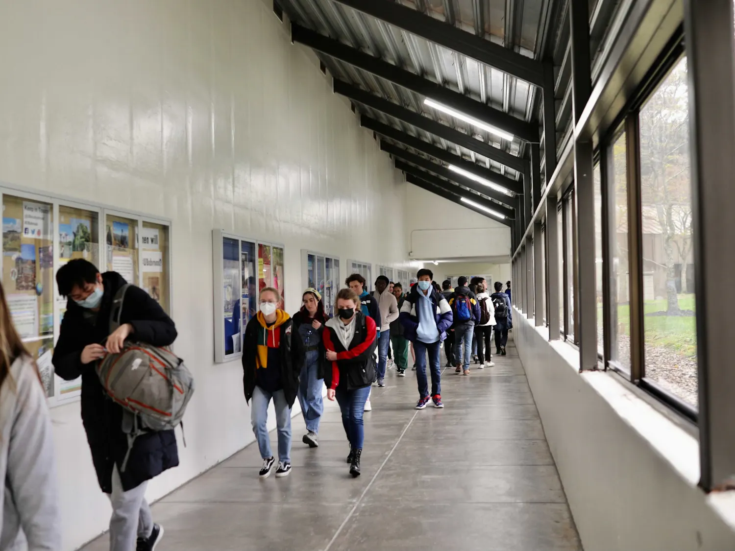 Students walk through the connecting tunnel between the Student Union and Knox Hall Monday.