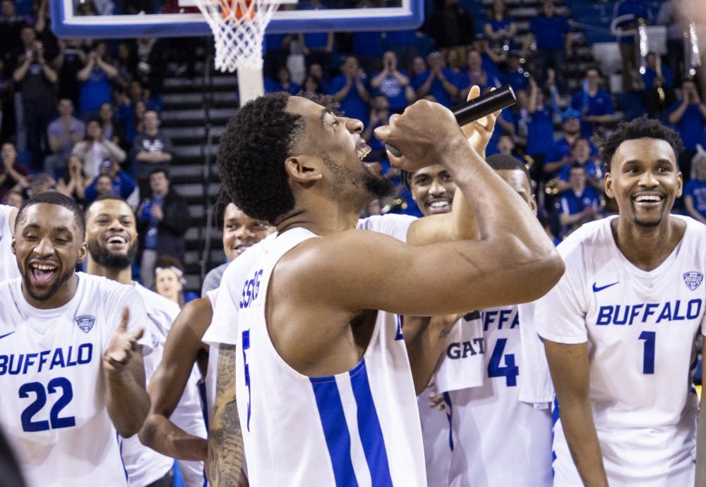 <p>Senior guard CJ Massinburg addresses the crowd after the Bulls’ senior night victory over Bowling Green. Massinburg passed Rasaun Young to be the number two all-time scorer in school history.</p>