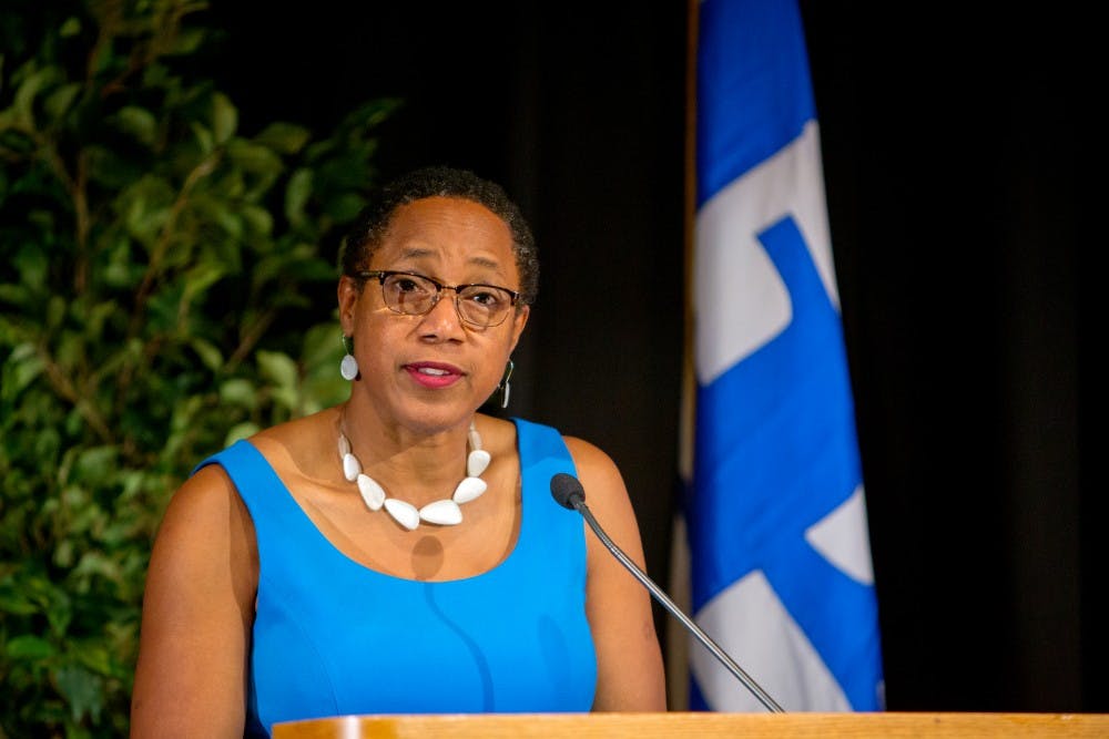 <p>Teresa Miller, former vice provost of the office of inclusive excellence, speaks to a crowd. Miller leave UB for a new role with SUNY as senior vice chancellor and chief of staff.</p>