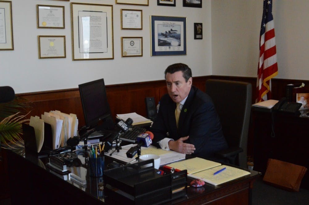 <p>Erie County District Attorney, John Flynn (pictured above), discusses the prosecution of a former UB student for drunk driving at a 2019 press conference.&nbsp;</p>