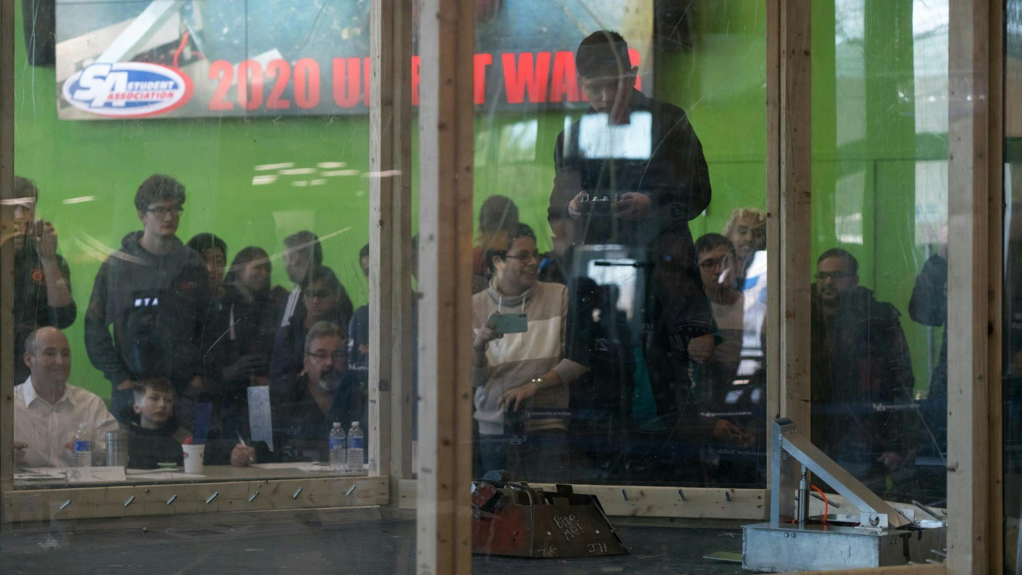 Michael Zhina focuses in as his team's robot stops functioning in the middle of their first round.