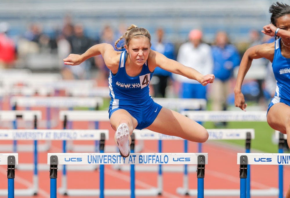 <p>Christine Lyttle jumps a hurdle. Lyttle became No. 2 in the MAC for the 60-meter hurdles during last Saturday’s meet.</p>