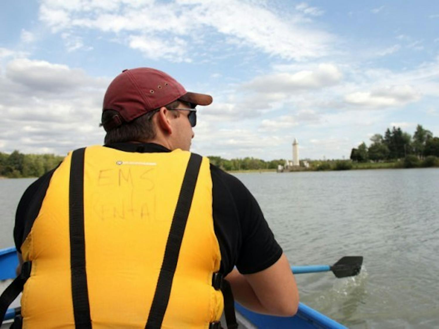 Senior archaeology major Nick Derrick explores Lake LaSalle via rowboat after Monday’s ribbon cutting ceremony. Andy Koniuch, The Spectrum