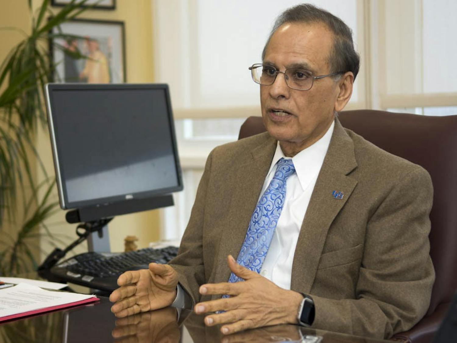 President Satish Tripathi sat with The Spectrum Wednesday afternoon in his presidential office. He was cheerful and smiled when talking about the success of the university.