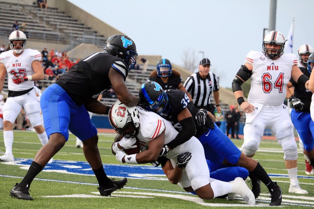 <p>Junior cornerback Cameron Lewis makes a tackle in Saturday's game. Lewis finished with seven tackles and two forced fumbles in the game.</p>