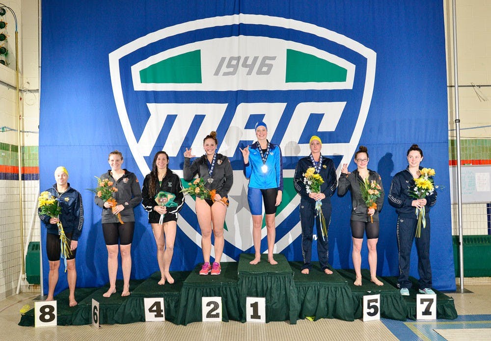 During the women's MAC Swimming and Diving Championship, held in Ypsilanti, Michigan Feb. 25-28, the Bulls finished with nine individual first-place finishes and two team relay wins in 20 events and finished fourth in the competition with 477 points. Jessica Powers (middle) claimed gold in the 500-freestyle, finishing ahead of (from left to right) Akron’s Kara Kaulius, Miami Ohio’s Stephan Pearce, Eastern Michigan’s Carly Jackson, Akron’s Ash Drazkowski, sophomore Paula Stoddard, Bowling Green’s Tara Capouch and Toledo’s Lauren Comer.