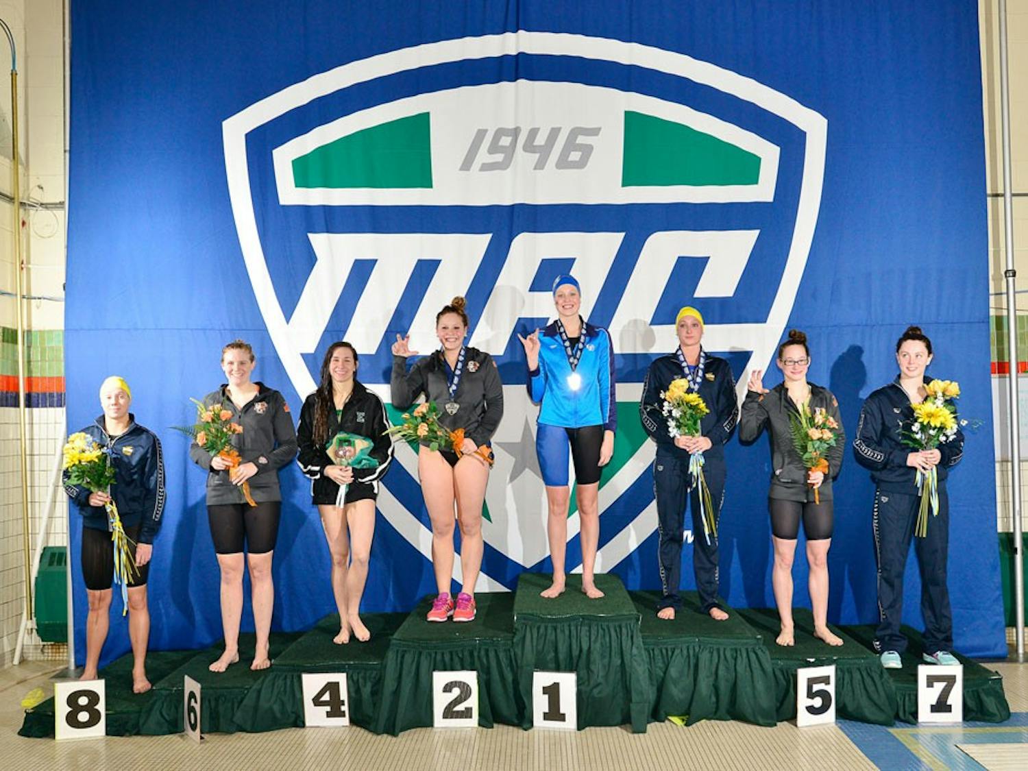 During the women's MAC Swimming and Diving Championship, held in Ypsilanti, Michigan Feb. 25-28, the Bulls finished with nine individual first-place finishes and two team relay wins in 20 events and finished fourth in the competition with 477 points. Jessica Powers (middle) claimed gold in the 500-freestyle, finishing ahead of (from left to right) Akron’s Kara Kaulius, Miami Ohio’s Stephan Pearce, Eastern Michigan’s Carly Jackson, Akron’s Ash Drazkowski, sophomore Paula Stoddard, Bowling Green’s Tara Capouch and Toledo’s Lauren Comer.