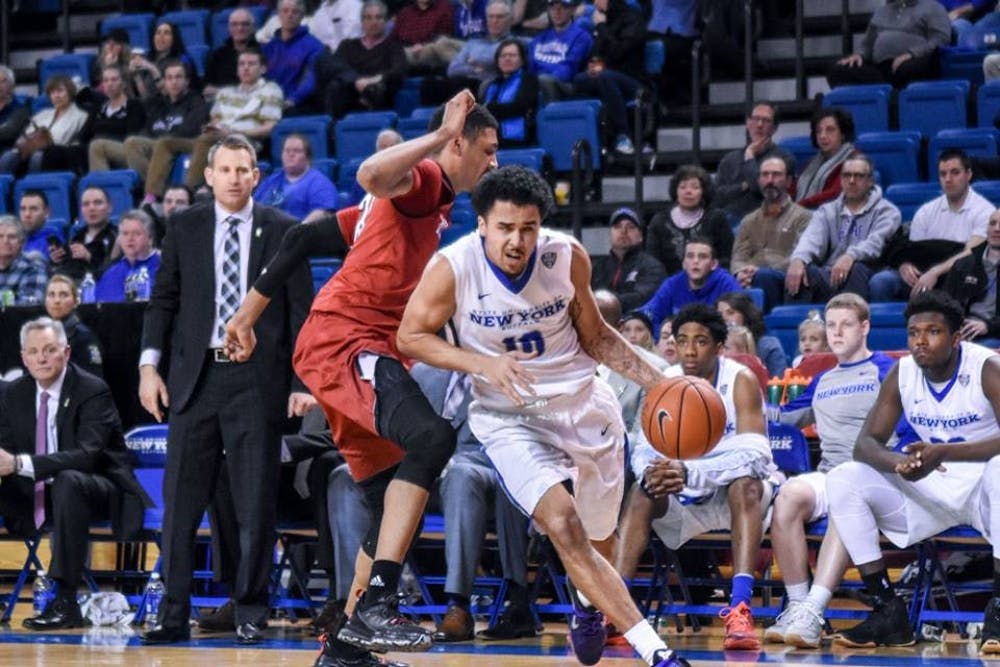 <p>Senior guard Jarryn Skeete looks to get around a Miami Ohio defender in Buffalo's 67-59 loss to the RedHawks in Alumni Arena on March 1.&nbsp;</p>