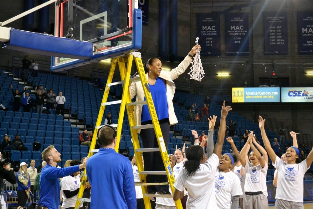 <p>Head coach Felisha Legette-Jack cuts down the nets after the Bulls secured the No. 1 seed in the MAC Tournament back in March. Legette-Jack's new contract comes after a historic season for the program.</p>