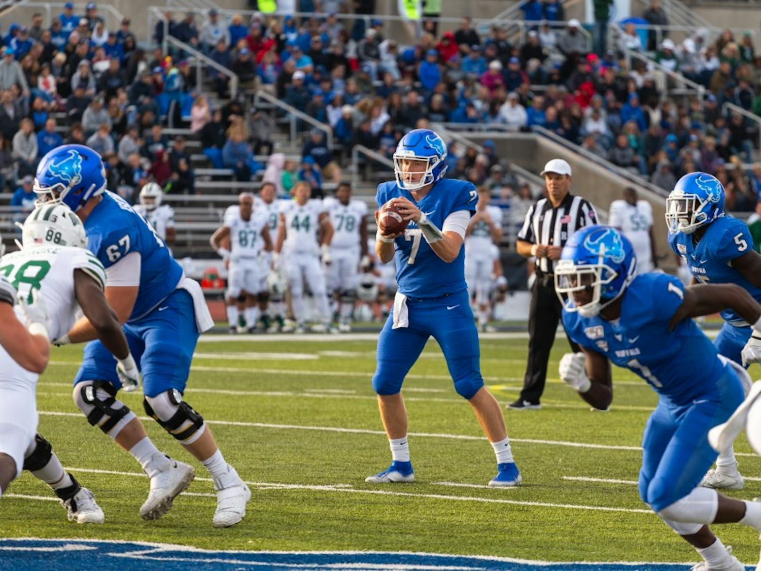 Quarterback Kyle Vantrease holds the ball against the Ohio Bobcats during the homecoming game at the UB Stadium on Saturday.