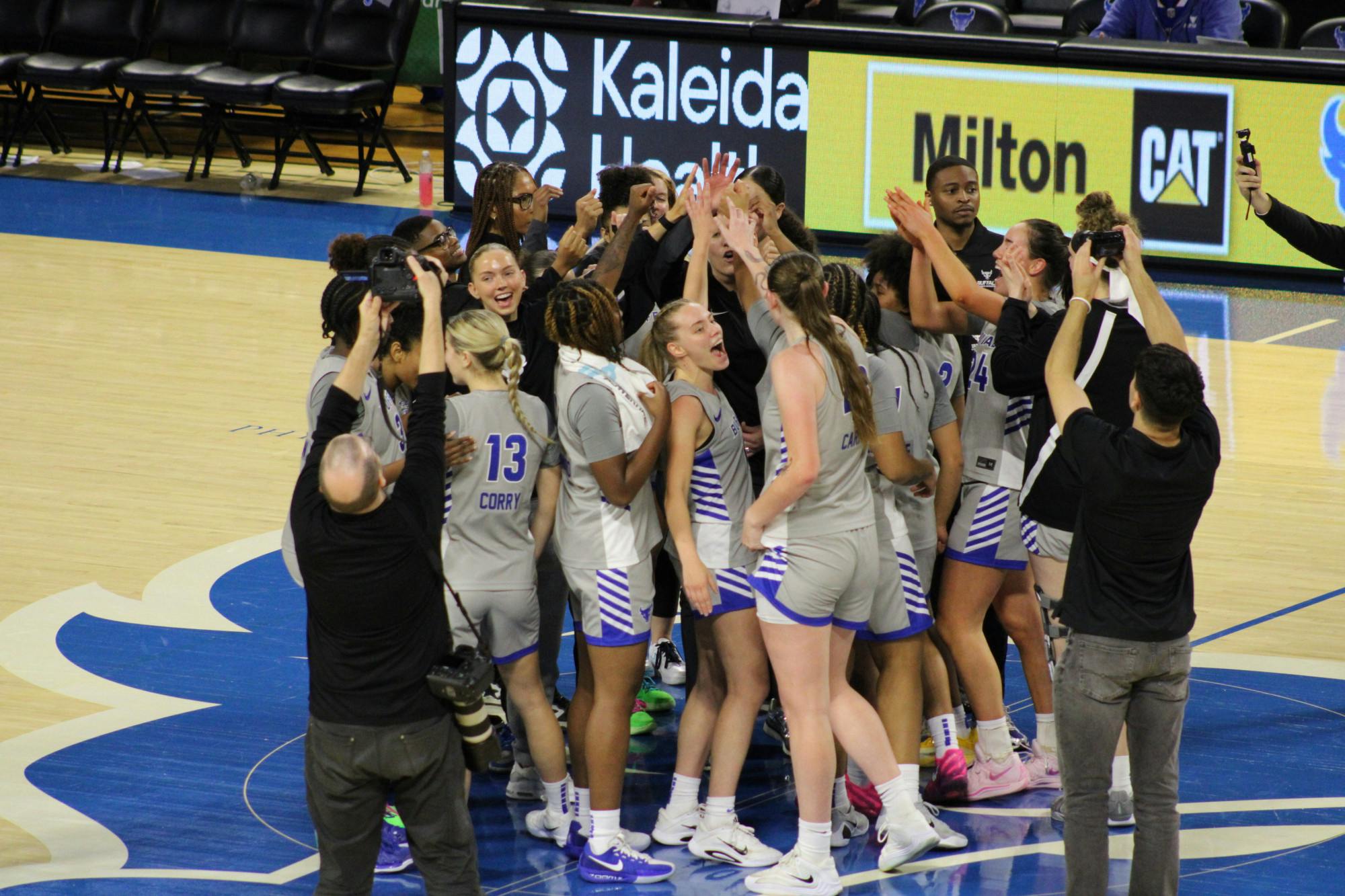 Team huddle during the women's basketball game against Fordham.