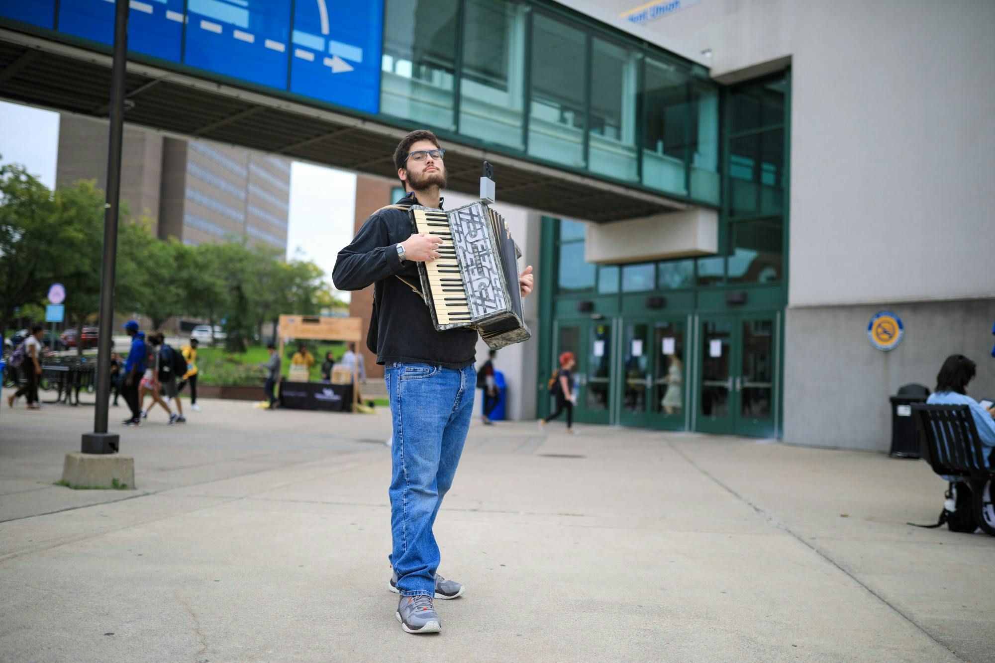 “Accordion guy” plays outside the Student Union.&nbsp;