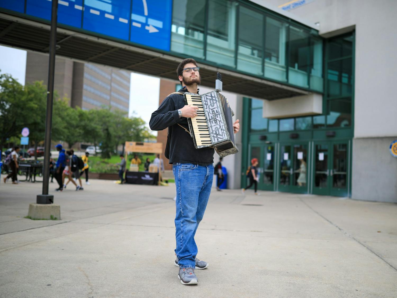 “Accordion guy” plays outside the Student Union.&nbsp;