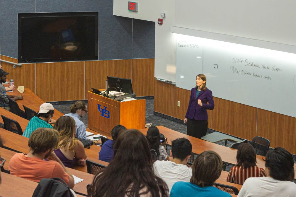 <p>Professor Amanda Kennell discusses “Spirited Away” and “Howl’s Moving Castle” to her class of 119 undergraduates</p>