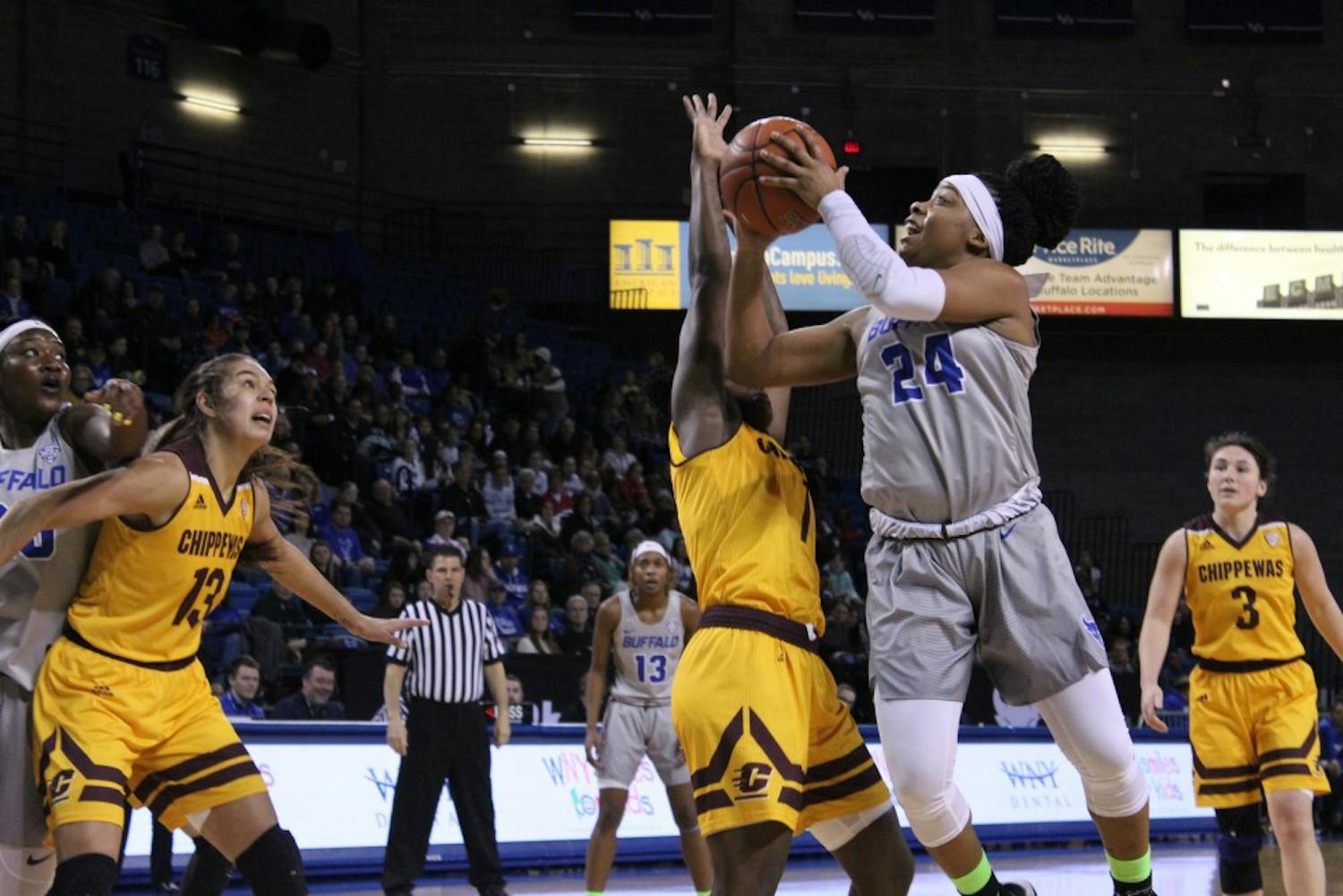 Senior guard Cierra Dillard goes up for a shot. Dillard recorded 31 points and 8 assists during the Bulls’ senior day win against the Miami (OH) RedHawks.