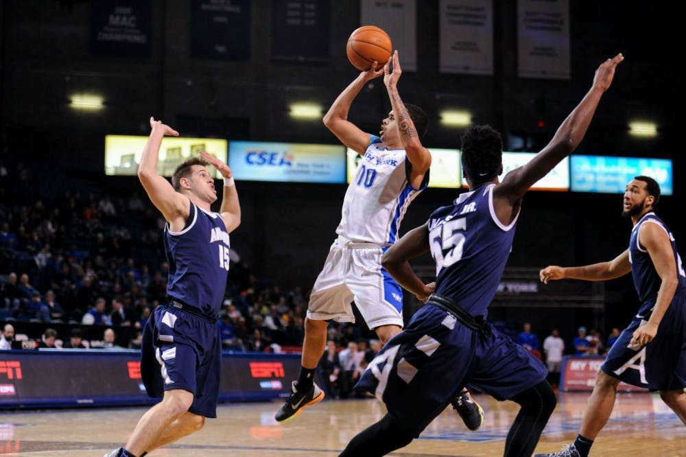 <p>Senior guard Jarryn Skeete takes a shot against Akron in a victory at Alumni Arena last season. Akron defeated the Bulls 75-71 in both team's first Mid-American Conference game of the season Tuesday night.&nbsp;</p>