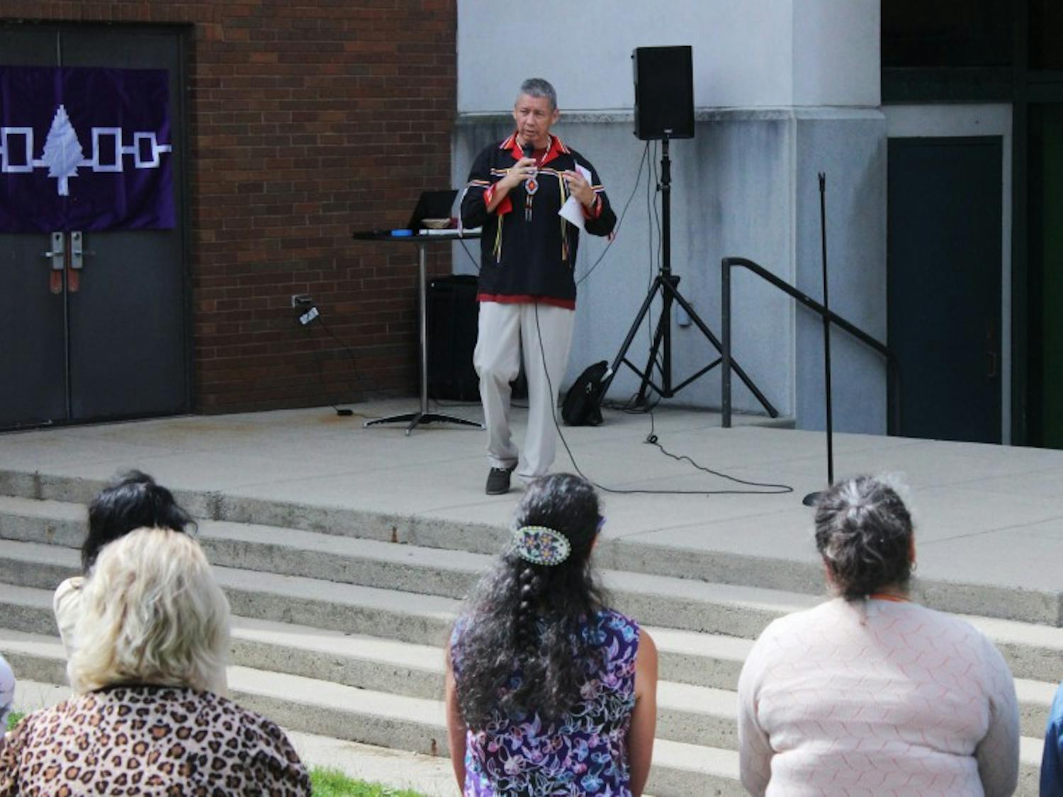 Pete Hill, ‘91 alum and “All Our Relations” director of the Native American Communities Services of Erie & Niagara Counties, speaks at the Native American welcome event outside the Student Union. NACS will work with the Office of Inclusive Excellence and faculty members this year to bring more inclusive events to UB.
