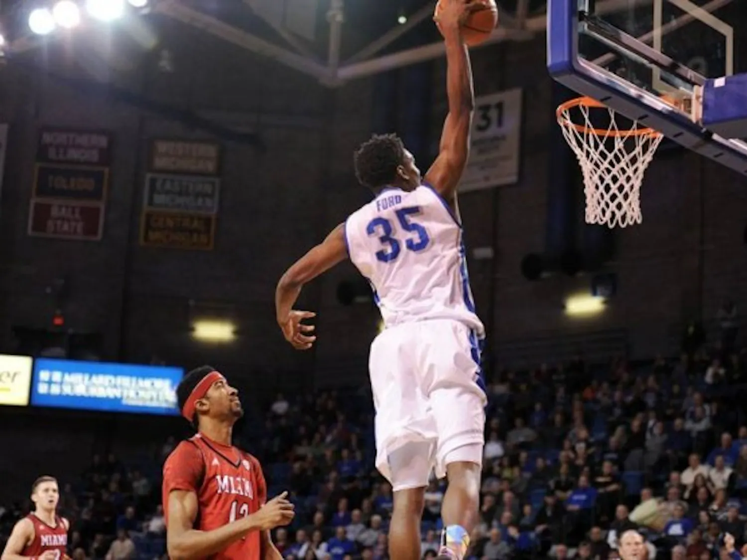 Xavier Ford scores two of his 13 points in Saturday's 77-68 victory over Miami Ohio. Yusong Shi, The Spectrum