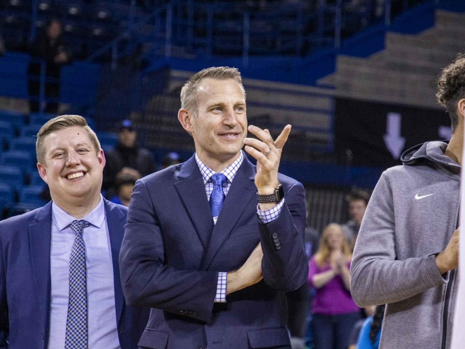 Former men’s basketball coach Nate Oats looks on during senior day. Oats was guaranteed a new recreation center as part of his new contract, and the university has plans to continue despite his departure.