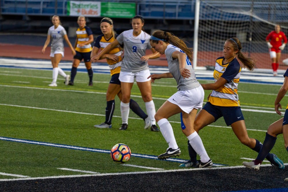 <p>Freshman midfielder Katherine Camper dribbles the ball past a defender. The Bulls lost 4-2 to Western Michigan this past Sunday in what was a season high in goals allowed.</p>