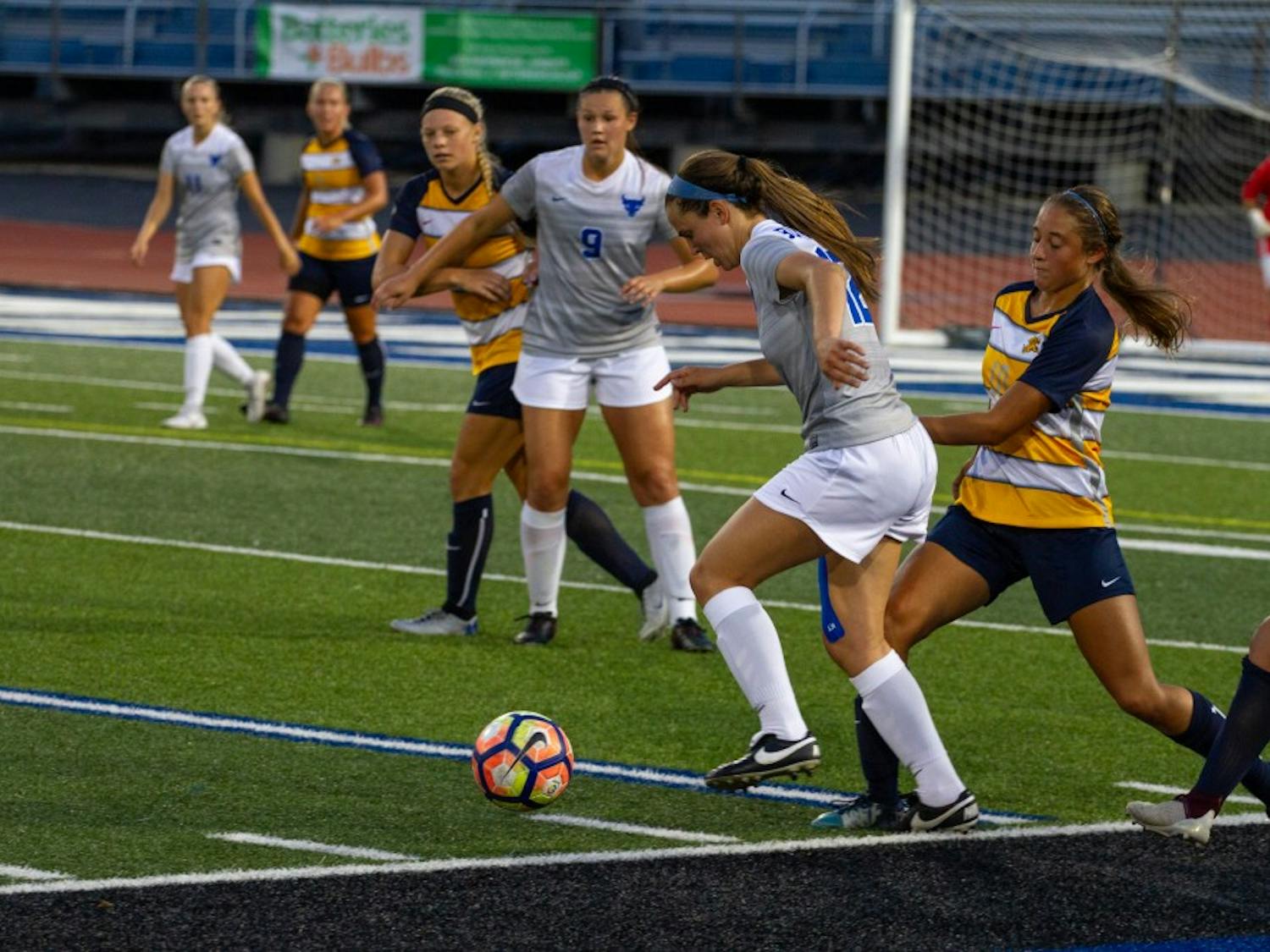 Freshman midfielder Katherine Camper dribbles the ball past a defender. The Bulls lost 4-2 to Western Michigan this past Sunday in what was a season high in goals allowed.