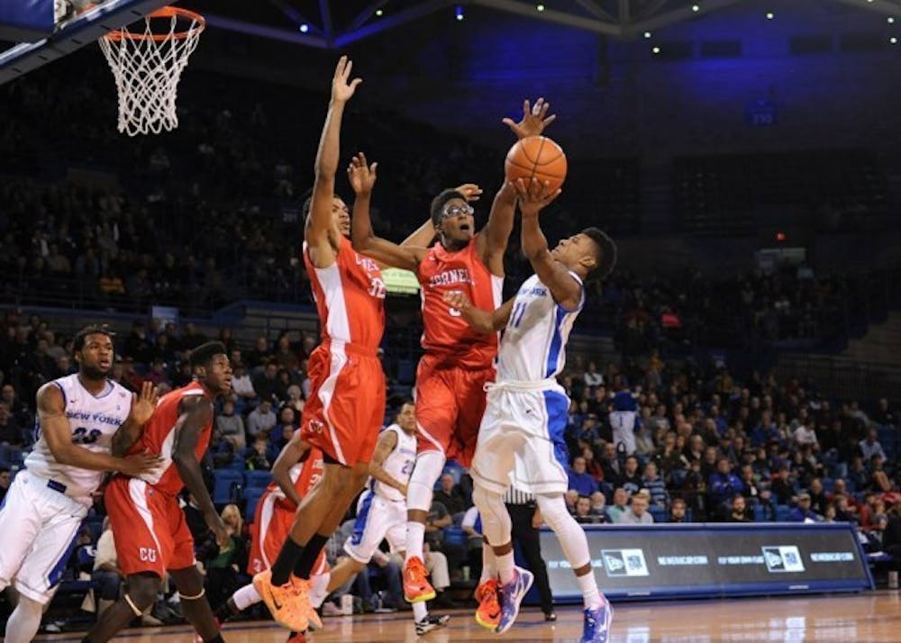 Sophomore guard Shannon Evans goes for a layup in&nbsp;Buffalo&#39;s 92-73 victory over Cornell on Saturday.
Evans&nbsp;scored a career-high 33 points in&nbsp;the victory which was the Bulls&#39; final game before MAC play begins.&nbsp;
Yusong Shi, The Spectrum.&nbsp;