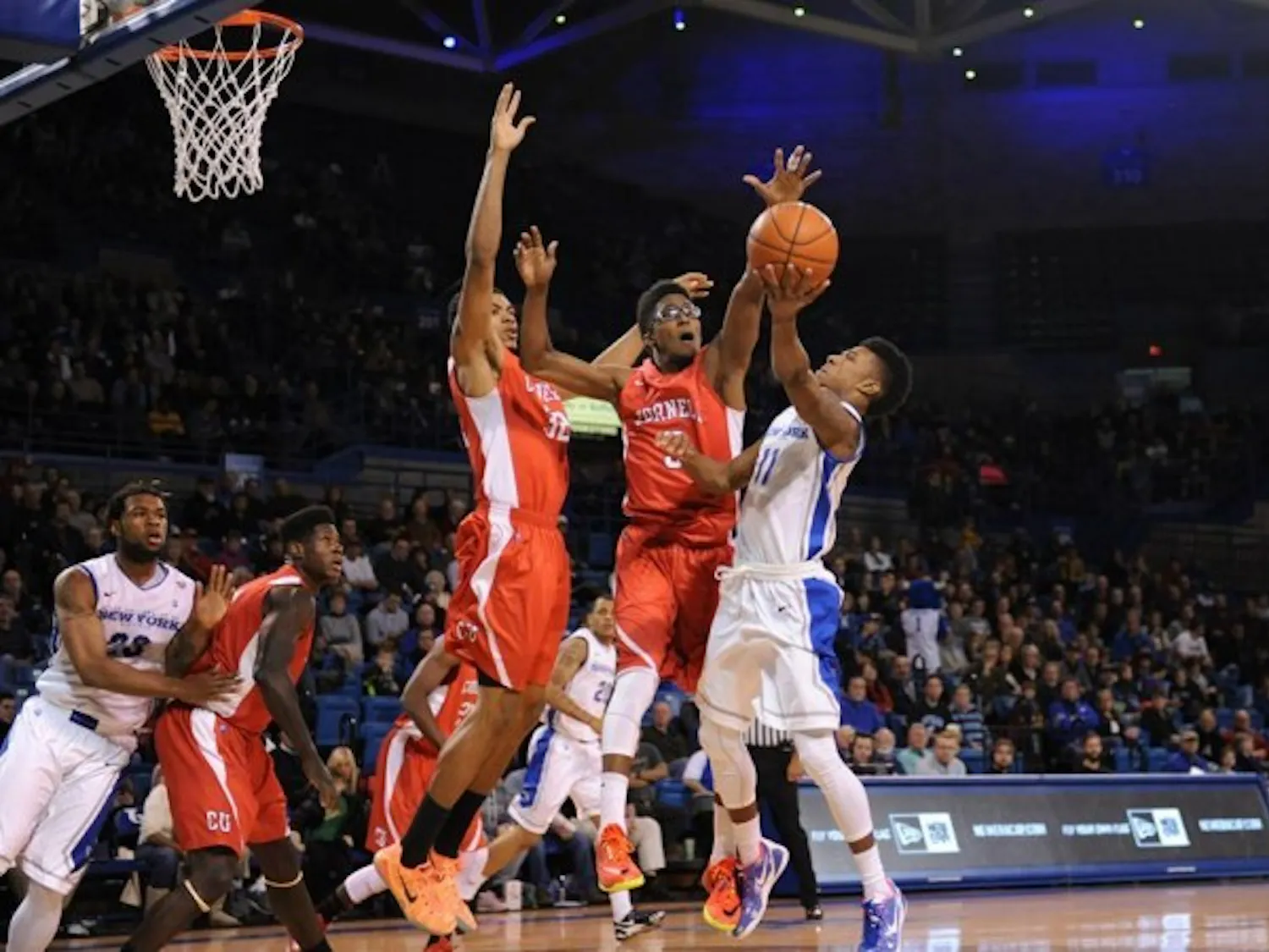 Sophomore guard Shannon Evans goes for a layup in Buffalo's 92-73 victory over Cornell on Saturday.
Evans scored a career-high 33 points in the victory which was the Bulls' final game before MAC play begins.
Yusong Shi, The Spectrum. 