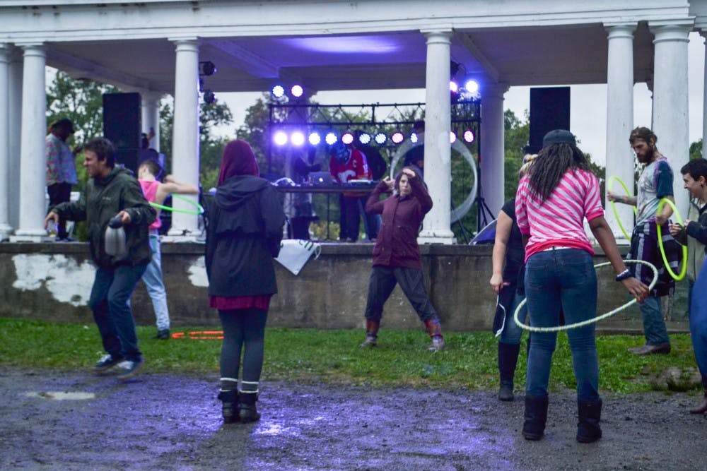 <p>Festival-goers at the 13th annual Music is Art Festival, held in Delaware Park on Saturday, dance in front of one of the eight stages. The festival featured performances by more than 100 bands and artists and other styles of visual and fine arts like dance, poetry and sculpting.</p>